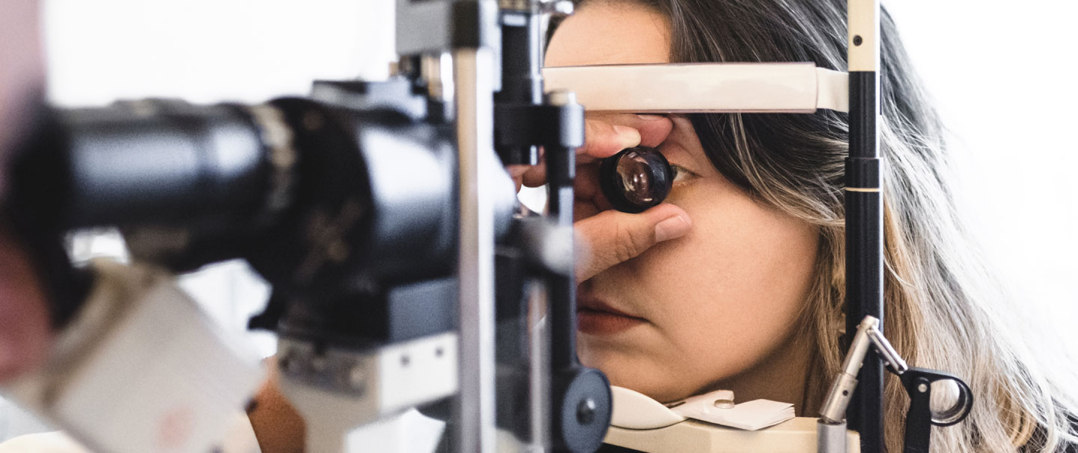 Woman having her eyesight tested