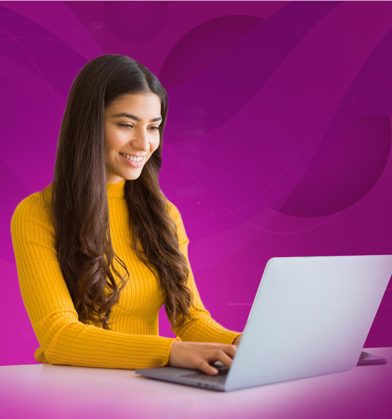 Smiling woman with a laptop