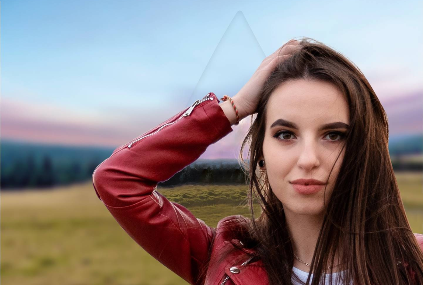 Woman in hike gear standing in the field