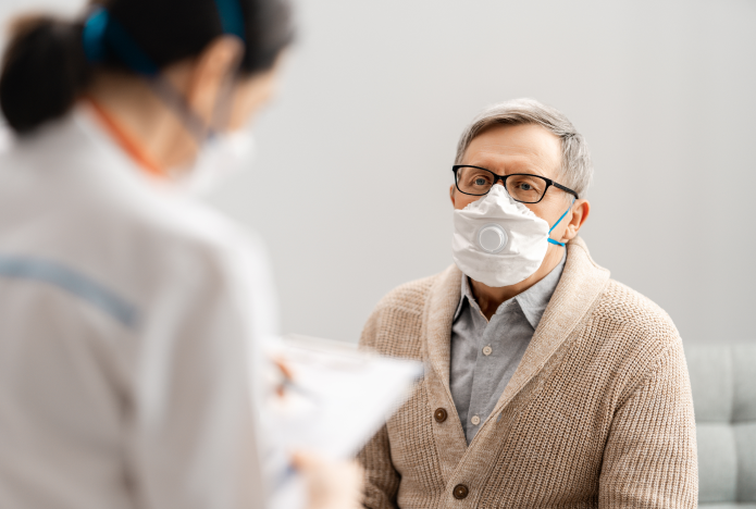 Elderly man wearing a mask